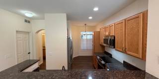 Immaculate Townhome Near Southlands with Granite Kitchen, Fireplace & Two Primary Suites Gallery 1