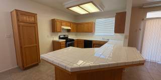 Spacious 3 Bedroom, 2 Bath Tevis Ranch Home with Fireplace, Covered Patio & 2-Car Garage Gallery 3