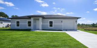 NEW CONSTRUCTION- Modern 3 Bed / 2 Bath Home in E Lehigh Acres Gallery 1
