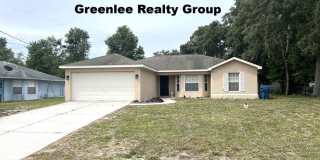 Spacious 3-bedroom, 2-bath Spring Hill home featuring an updated kitchen, no carpet, a 2-car garage, and a large fenced backyard with covered porch—perfect for entertaining! Gallery 1