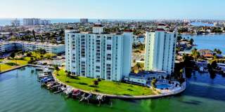 Available on April 15 - Stunning Furnished Waterfront Condo – 2 Beds / 2 Baths with Gulf-to-Bay Views! Gallery 1