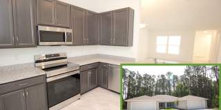 Spacious 4 Bed 2 Bath 2 Car Townhome Built in 2022 in Palm Coast! Gallery 1