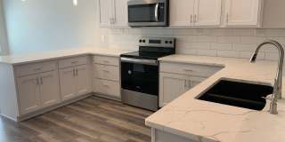 Zero entry ranch townhome with 2 stall garage. Laundry on main level, 2 bedrooms/2.5 bath in SE Lincoln Gallery 1