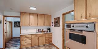AVAILABLE NOW, LARGE YARD AND DETACHED 2 CAR GARAGE, UPDATED FLOORS AND BATH, $0 DEPOSIT OPTIONS! Gallery 11