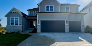 {17621} Wild Horse New Construction + Newport 1.5 Story Floor Plan by Wheeler Homes + Main Floor Primary Bedroom + Covered Patio Gallery 1