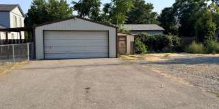 Spacious 2 bed/1 bath home! Fenced yard, a/c, d/w, w/d, large garage and MORE!! Gallery 5