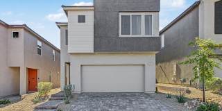 5-Bedroom Home for Rent in Gated Kyle Canyon Community | Downstairs Bedroom | Modern Kitchen Gallery 1
