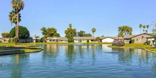 Welcome to this stunning updated 2-bedroom, 2-bathroom home on a lake located in the vibrant community of Leisure World, a 45+ Active Adult Resort Community.  Available for May through October 2026. Summer Rental only. Gallery 1