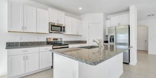Newer fully fenced backyard 4 Bds/2.5 Bths Home with great floor plan and Resort community Gallery 7