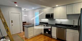 Duplex Near BU!  Brand New Luxury Renovation!   Samsung TV Included!   Breakfast Bar!  High End Appliances Gallery 4