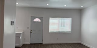 247 1/4 E. Adams Blvd. Gallery 1