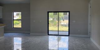 Brand-New Luxury Home with Office, 3-Car Garage & Designer Upgrades | Modern Living in Cape Coral! Gallery 12