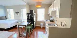 Nicely updated, studio on the Green Line in Brighton. Gallery 3