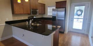 This 3 bedroom 2.5 bath brick townhouse with one car garage is located in Westgate Shoreline subdivision Gallery 4