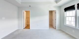 Welcome to this beautifully designed 3 level townhome in Westphalia Town Center Community! Gallery 16