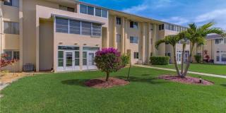 55+ Charming first-floor condo nestled in the serene Fairways 3 Condominiums Gallery 1