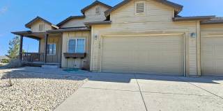 Golden Valley Stunner! 3 Car garage with Extra Toy Storage Gallery 1