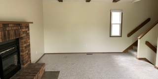 2 BR, 1.5 BA Clive split level duplex.  Deck and one car attached garage. Gallery 10