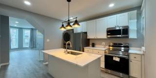 4-Bedroom Townhome W/Modern Amenities - JHU 4-Bedroom Townhome W/Modern Amenities - JHU Gallery 1