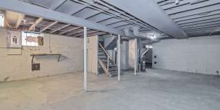 Charming 3BR Home with Classic Woodwork, Porch & Bonus Attic Space Gallery 19