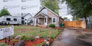 Spacious 3-Bedroom Englewood Home with Large Yard, Oversized Kitchen & 2-Car Garage Gallery 1