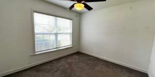 MOVE IN NOW!! Gated community Miriada! 1st floor 1X1.5 bath condo near pool area!!! Laminate wood flooring in living area and carpet in bedroom! Has washer & dryer! Gas stove & water heater! Gallery 19