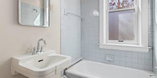 Stunning 3 bedroom main floor unit in prime Saint Paul location. Gallery 11