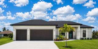 Brand-New Luxury Home with Office, 3-Car Garage & Designer Upgrades | Modern Living in Cape Coral! Gallery 1