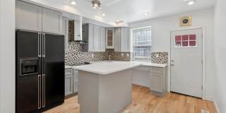 Updated 2BR Townhome with Dual Ensuite Baths, Hardwood Floors & Private Patio in Grays Ferry Updated 2BR Townhome with Dual Ensuite Baths, Hardwood Floors & Private Patio in Grays Ferry Gallery 1
