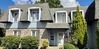 Cozy 2-Story Townhome In Beaverton | 2 BD | 1.5 BA | Back Deck Overlooking a Scenic Creek | W/S/T Included in Monthly Rent! Cozy 2-Story Townhome In Beaverton | 2 BD | 1.5 BA | Back Deck Overlooking a Scenic Creek | W/S/T Included in Monthly Rent! Gallery 1