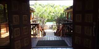 Very private, mostly furnished, rustic Maui Meadows home with large pool, walk around deck with panoramic ocean views. Available for 6 months only. Gallery 9