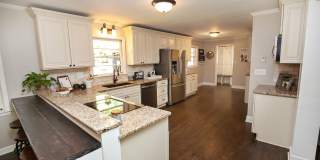 Fully renovated ranch with finished basement, flat fenced in backyard, walking distance to Canton St., Roswell Gallery 7