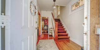 Charming 5-Bedroom Home with Exposed Brick and Modern Upgrades Gallery 6