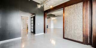 Modern Industrial Loft at Soho Lofts – 1BR/2BA High-Rise in the Arts District, City & Mountain Views! Gallery 27