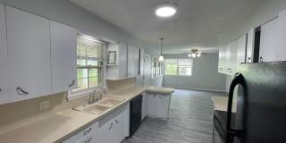 Beautiful 3 bedroom 1.5 bath waiting for you to call home . Gallery 11