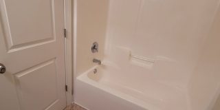 This 3 bedroom 2.5 bath brick townhouse with one car garage is located in Westgate Shoreline subdivision Gallery 17