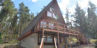 Garden level one bedroom apartment in the hills above BRECK.  Pets OK!  Includes HEAT and electric!  One Car Space in the Garage! Gallery 1