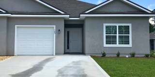 3/2 with landscaping included! Gallery 1