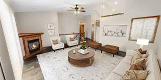 BEAUTIFUL & SPACIOUS 4 BD, 2 BA TOWNHOME WITH A FULLY EQUIPED KITCHEN, VAULTED CEILINGS, FIREPLACE, ATTACHED GARAGE & PET FRIENDLY!! Gallery 1