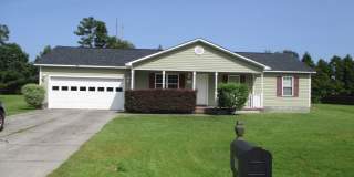 Charming three bedroom two bath home located off Piney Green. Gallery 1