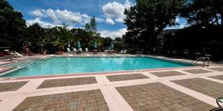 MOVE IN NOW!! Gated community Miriada! 1st floor 1X1.5 bath condo near pool area!!! Laminate wood flooring in living area and carpet in bedroom! Has washer & dryer! Gas stove & water heater! Gallery 35