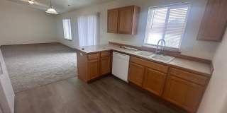 Newer Carpet, flooring & paint! 3 Bedroom 2 Bath with 2 car attached garage. Gallery 1