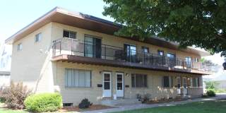 Modern, comfortable townhome living just steps from the Fox River and Oshkosh’s lively downtown. Gallery 1