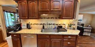 Quiet Ranch Retreat Steps from Light Rail with Finished Basement & Designer Kitchen Gallery 8
