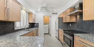 Welcome to this beautiful 4-bedroom, 3-bathroom home in Tempe Arizona! Gallery 1
