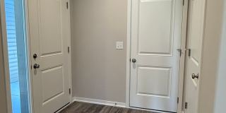Ranch townhome with 2 stall garage. Spacious 2 bedrooms with walk in closets, 2.5 bathroom, 1st floor laundry Gallery 5