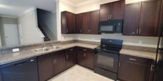 Inviting 2 Bedroom Townhome | Ideal Location & Functional Layout Gallery 4