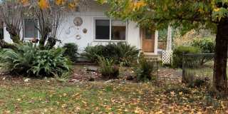 Peaceful Country Living – Beautiful 2 Bed, 2 Bath Home with Large Deck Gallery 1
