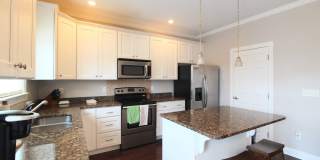 4-Bedroom Townhome with over 2300 Square Feet and a Finished Basement in popular Bluestone Hills!  Convenient to downtown and JMU! Gallery 10