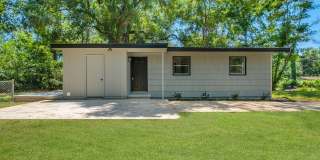 NEWLY RENOVATED 3/1 House w/ Plank Floors Throughout, Gorgeous Kitchen, and Large Yard! Avail NOW for $1350/month! Gallery 1